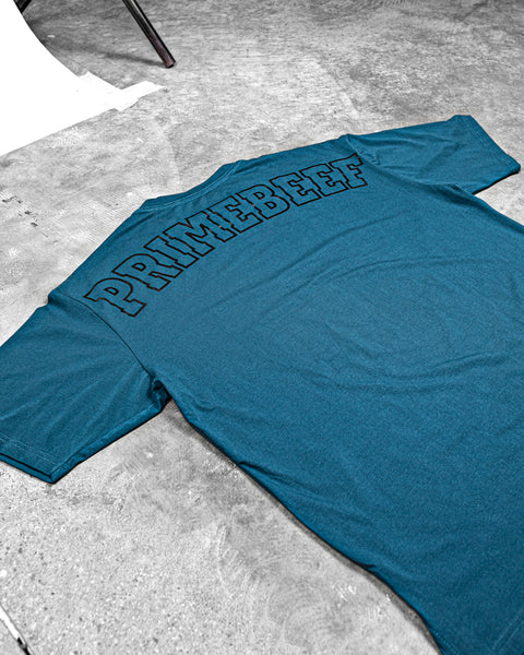 OVERSIZED TRAINING TEE – PRIMEBEEF / TEAL BLUE