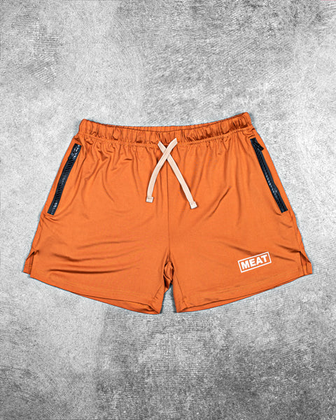 SQUATTING SHORTS – RETRO / AMBER ORANGE