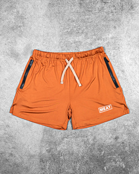 SQUATTING SHORTS – RETRO / AMBER ORANGE