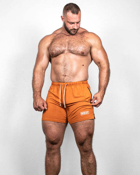 SQUATTING SHORTS – RETRO / AMBER ORANGE