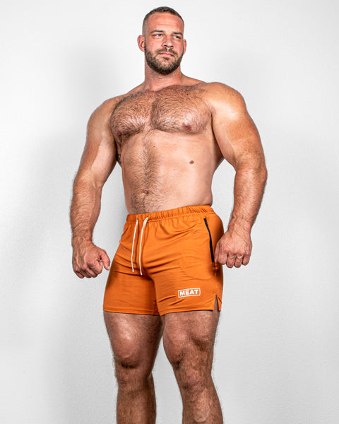 SQUATTING SHORTS – RETRO / AMBER ORANGE